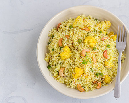 Vegetable Fried Rice with Cauliflower in a Bowl Top Down Photo