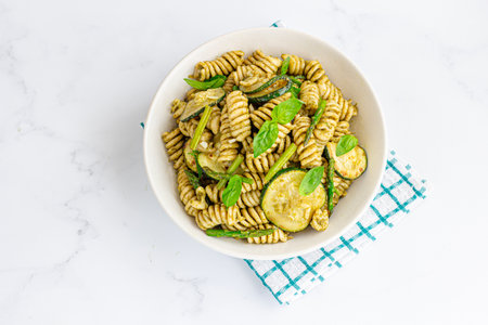 Basil Pesto Pasta with Asparagus and Zucchini Top Down Flat Lay Photoの写真素材