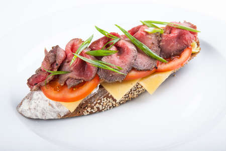 bruschetta with roast beef tomato cheeseの写真素材