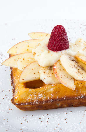 delicious sweet dessert on white plate with teaの写真素材