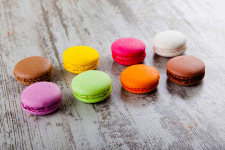colored macaroon on wooden backgroundの写真素材