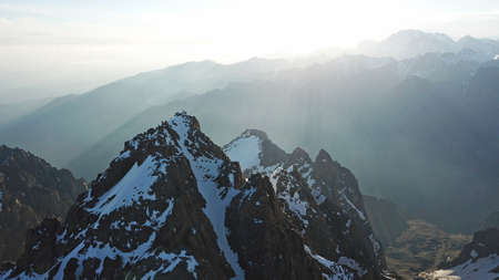 Huge snow mountains. View from a drone.の写真素材