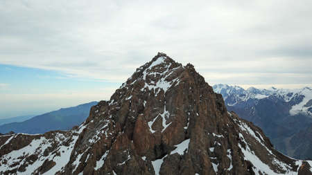 Huge snow mountains. View from a drone.の写真素材