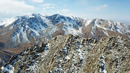 Top view of a group of tourists on a peakの写真素材