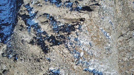 Mountain tops covered with snow. View from a droneの写真素材