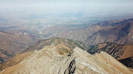 Mountain tops covered with snow. View from a droneの写真素材