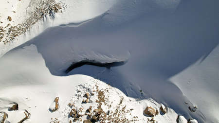 A huge crack in the ice. The entrance to the cave.の写真素材