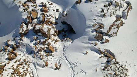 A huge crack in the ice. The entrance to the cave.の写真素材