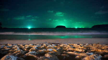 Green illumination of the sky at sunset.の写真素材