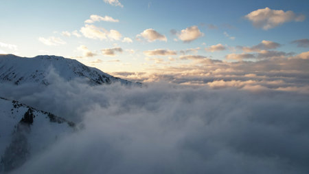 Flying among the ocean of clouds in the mountainsの写真素材
