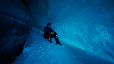 The climber made a halt inside an ice cave.の写真素材