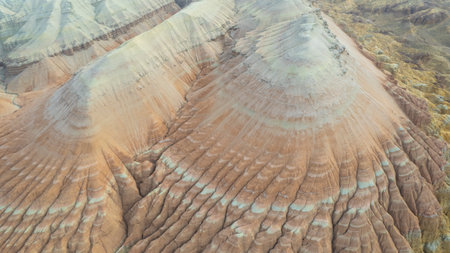 Colorful high mountains and a canyon made of clayの写真素材