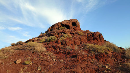 A volcanic place. Frozen old lava. Red Mountainsの写真素材