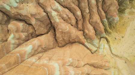 Colorful high mountains and a canyon made of clayの写真素材