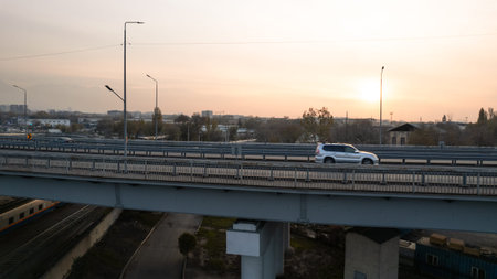 Drone view of the bridge passing through the city.