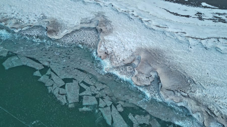An unusual pattern of an ice hummock on the lake