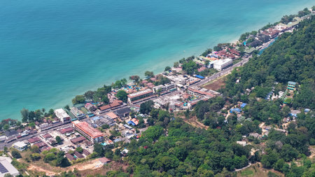 Aerial view of coastal town with lush greeneryの写真素材