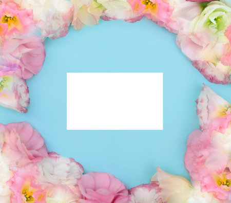 Beautiful frame composition with eustoma flowers on color background