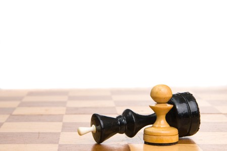 Chessmen on a chessboardの写真素材