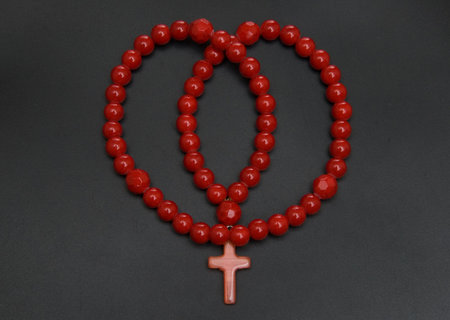 Red coral beads on a black backgroundの写真素材