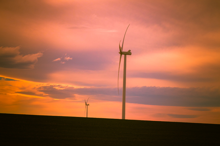 There was a fantastic sunset...and a couple of wind turbines on the drive home.の写真素材