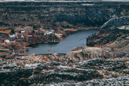 the homes deep in the canyon at Shoshone Falls.の写真素材