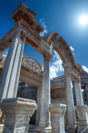 The ruins and ruins of the ancient city of Ephesus against the blue sky on a sunny day.