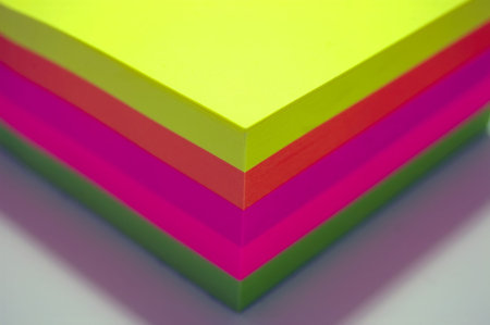 a pad of colorful postit notes