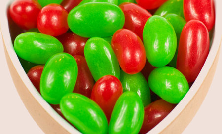 A macro of red and green Christmas jellybeans