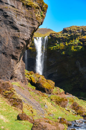Majestic Waterfall in the Heart of Iceland's Wildernessの写真素材