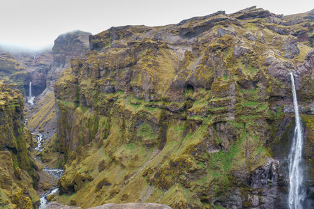 Waterfall in the mountains of the Faroe Islands, Denmark.の写真素材
