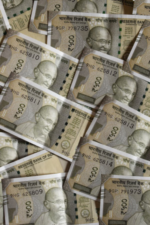 Top view of background made with five Hundreds banknotes. Rupees cash. india money concept.