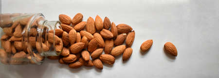 Dry Almond Salted Roasted top view background or texture. Healthy spices, nuts, seeds and herbal products.の写真素材