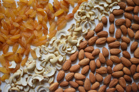 Healthy food: mix from dried fruits in the white background, selective focusの写真素材
