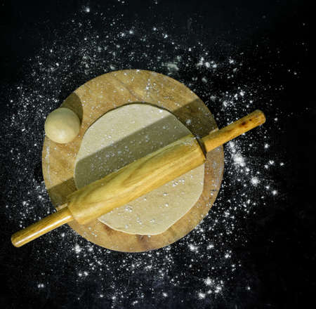 Indian Traditional Cuisine Chapati Also Know as Roti, Fulka, Paratha, Indian Bread, Flatbread, Whole Wheat Flat Bread, Chapathi, Wheaten Flat Bread, Chapatti, Chappathi or Kulcha on black Backgroundの写真素材