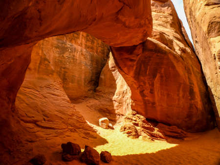 Sand and red stones turn everything orange, Arches National Park, Utah, USAの写真素材