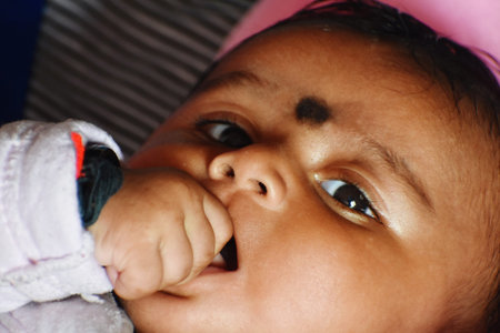 A cute little baby girl in joy mood