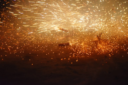 sparks fly through the air