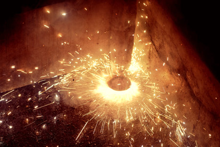 sparks from welding at a construction site, closeup of photo