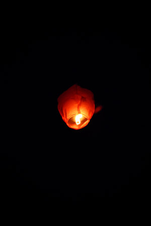 Lantern in the night sky at Chiang Mai, Thailandの写真素材