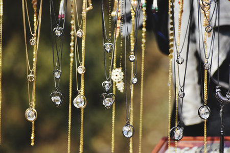 Jewelry on sale in the market, closeup of photoの写真素材