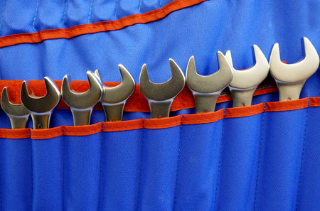 Close-up of a set of wrenches in a blue case
