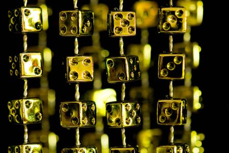 garland from yellow playing bones on the isolated backgroundの写真素材