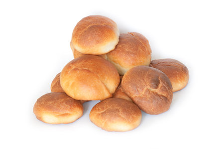 Fresh small bread on a light background