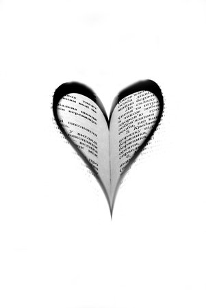 Shade in the form of heart on the bookの写真素材