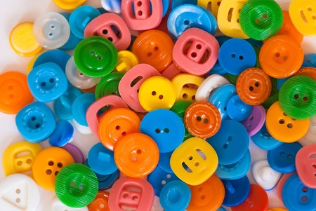 Abstract background from a collection of old buttonsの写真素材