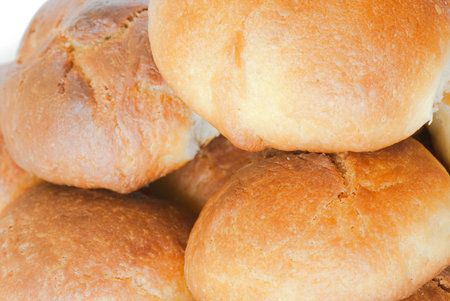 Fresh small bread on a light background