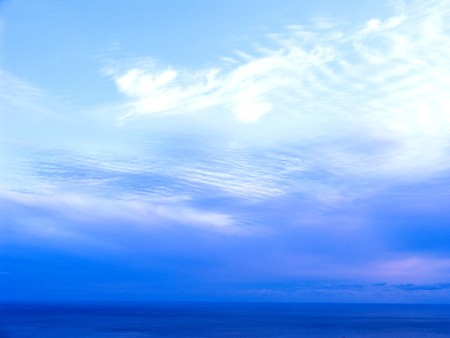 White clouds in a blue sky. Great backgroundの写真素材