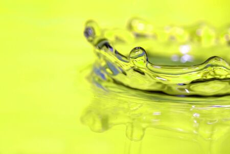 Abstract background from splash in a drop of waterの写真素材