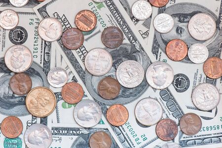 background from a large number 100 dollar and centsの写真素材